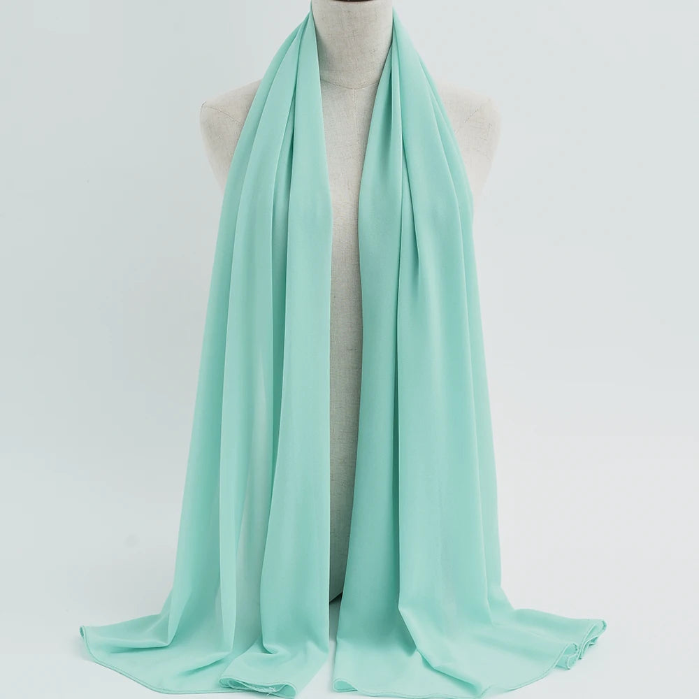 Elegant and versatile, the pearl-embellished silk chiffon hijab is the perfect accessory to elevate your outfit with style and grace.