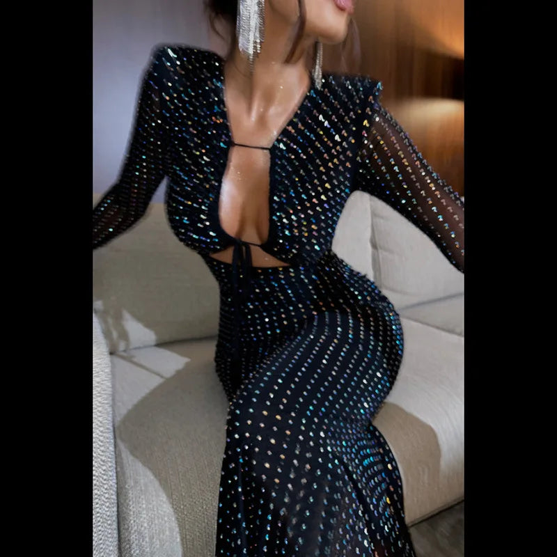 Discover the Elegance and Trend of Fashion with this Sequin Maxi Dress Featuring Cryptographic Details!